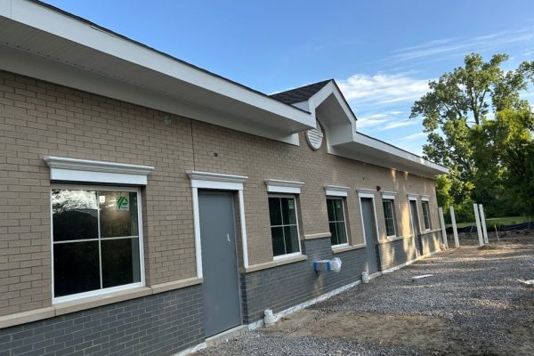 Exterior Construction Progress Of The Learning Experience Educational Facility Featuring New Brick Façade, Windows, And Entry Doors By Schonsheck, Inc.