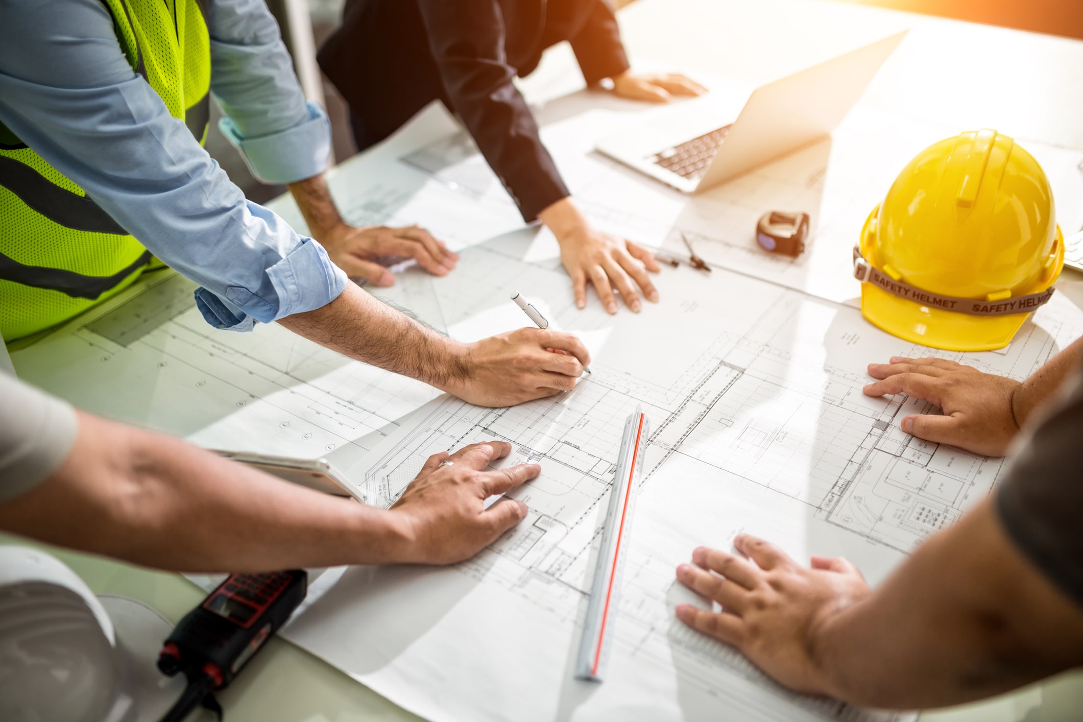 A business owner and our engineers planning a build
