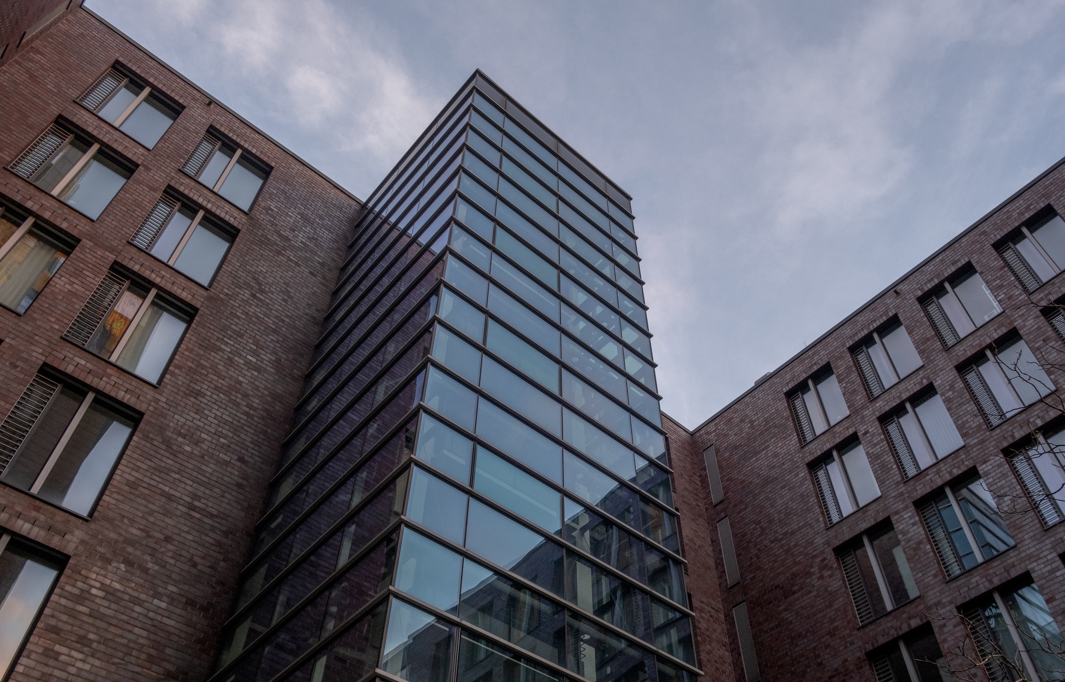 Modern commercial building with glass and brick exterior designed for long-term business use.